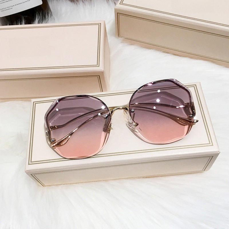 New Fashion Borderless Cutting Sunglasses Female Multi-deformation Metal Arc Mirror Leg Net Red Street Photo Sunglasses