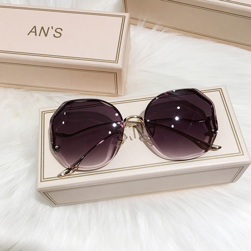 New Fashion Borderless Cutting Sunglasses Female Multi-deformation Metal Arc Mirror Leg Net Red Street Photo Sunglasses