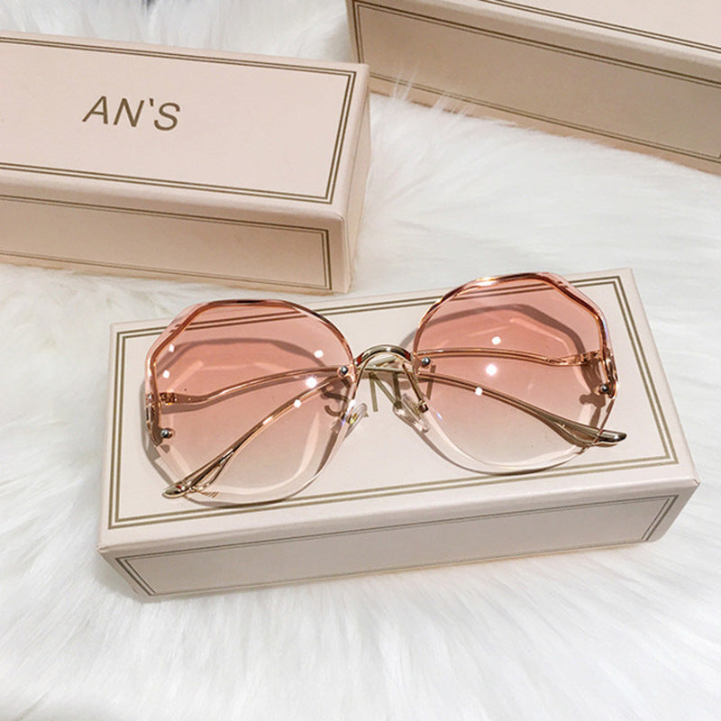 New Fashion Borderless Cutting Sunglasses Female Multi-deformation Metal Arc Mirror Leg Net Red Street Photo Sunglasses
