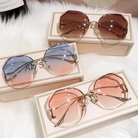 New Fashion Borderless Cutting Sunglasses Female Multi-deformation Metal Arc Mirror Leg Net Red Street Photo Sunglasses
